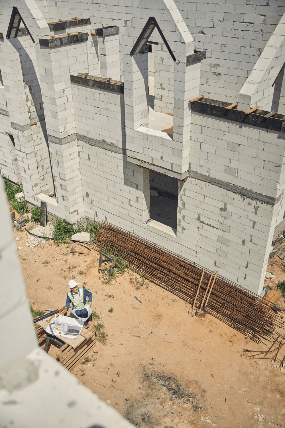 construction-worker-reviewing-plans-at-constructio-2026-03-10-04-02-26-utc